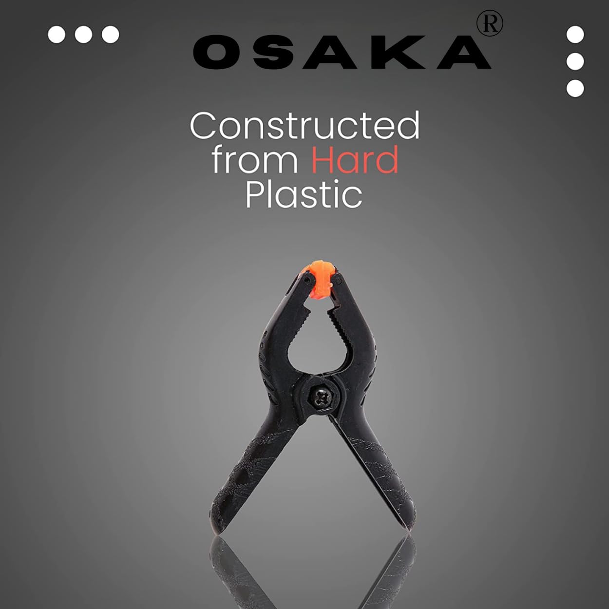 Black clamp with orange clip on a gray background, featuring the Osaka brand.